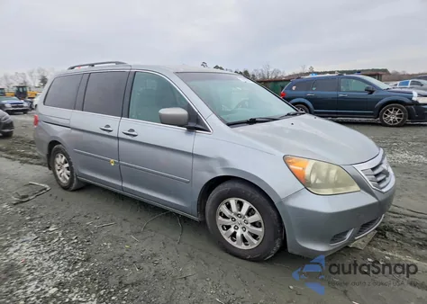 2010 Honda Odyssey Ex z USA, uszkodzony, nr VIN 5FNRL3H59AB011789